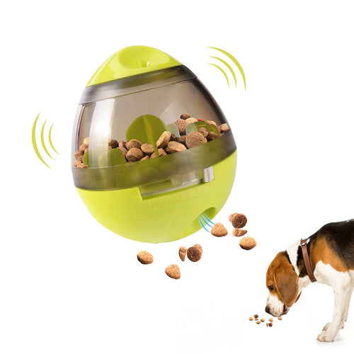 Treat-dispensing slow feeder ball releasing kibble as a beagle plays